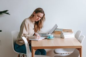 Girl Focusing While Working on Computer (1)